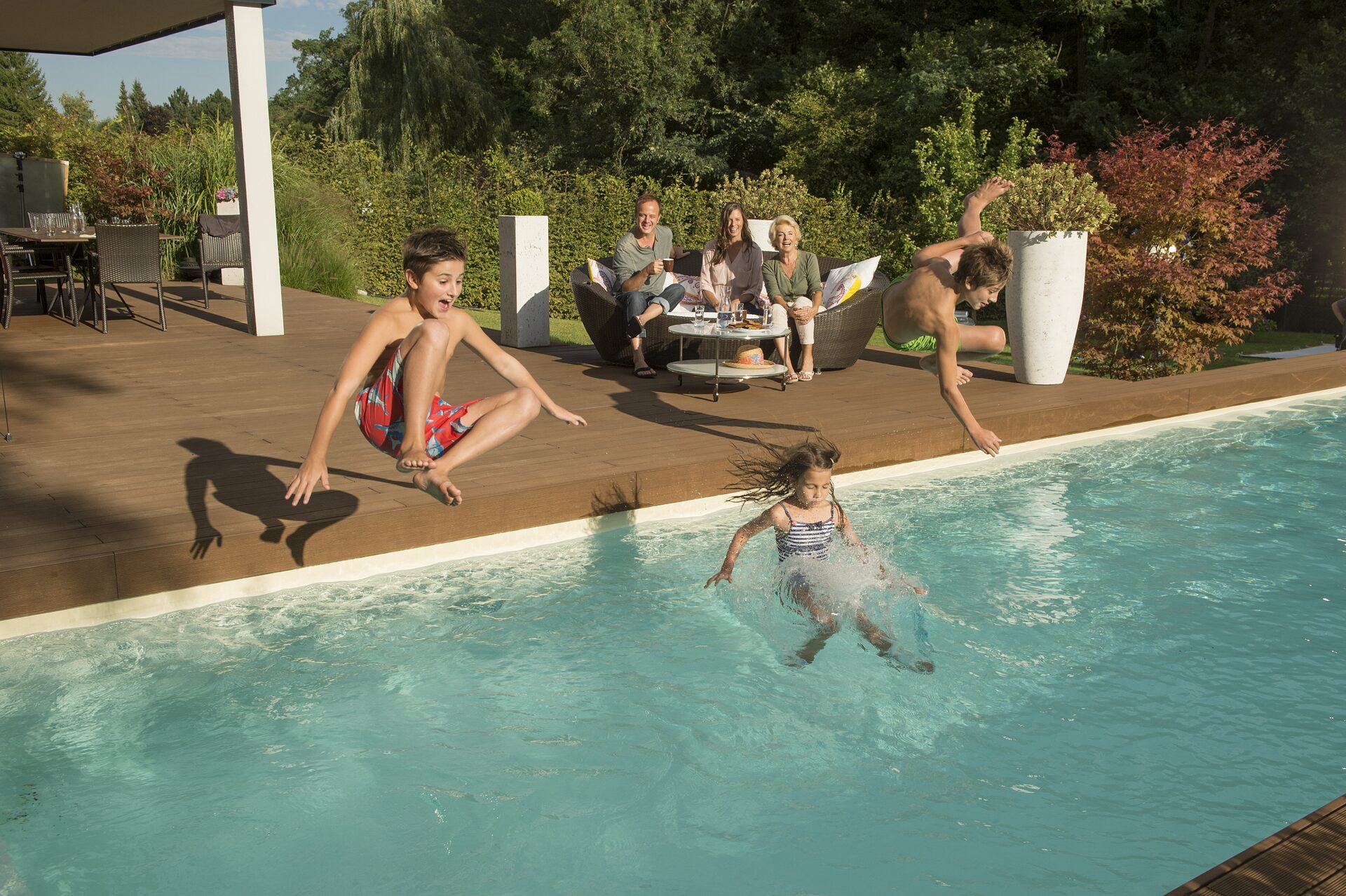 Family at the hotel pool with revitalized water